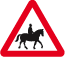 Accompanied horses road sign