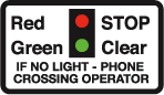 Miniature warning lights at level crossing